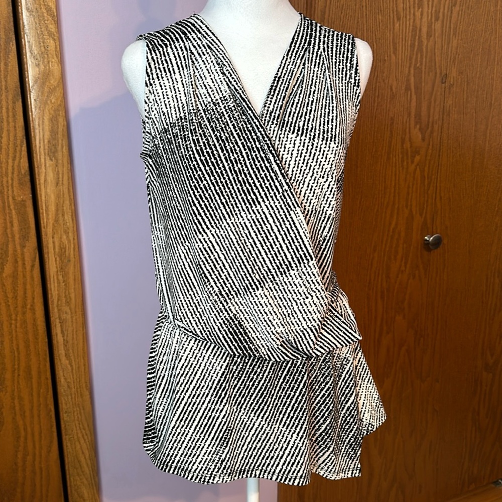Two White House Black Market size small tunics.